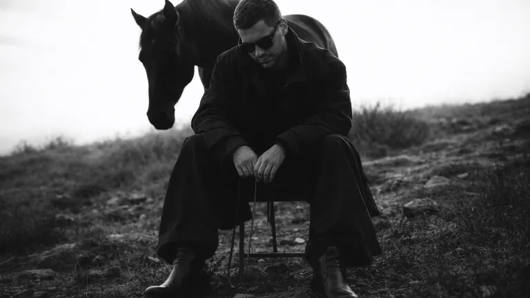 Monochrome Fine Art Fashion Editorial with Horse | Cinematic Luxury Portrait , monochrome fashion photography, fine art editorial portrait, black horse fashion shoot, cinematic luxury photography, avant garde fashion editorial, minimalist outdoor portrait, high contrast fine art photo, medium format look