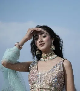 Moody Intimate Portrait with Glowing Fairy Lights , moody portrait, intimate portrait photography, fairy lights portrait, dark background portrait, glowing lights photography, dreamy portrait, mysterious female portrait, low key lighting, cozy aesthetic photography, melancholic mood portrait, warm light