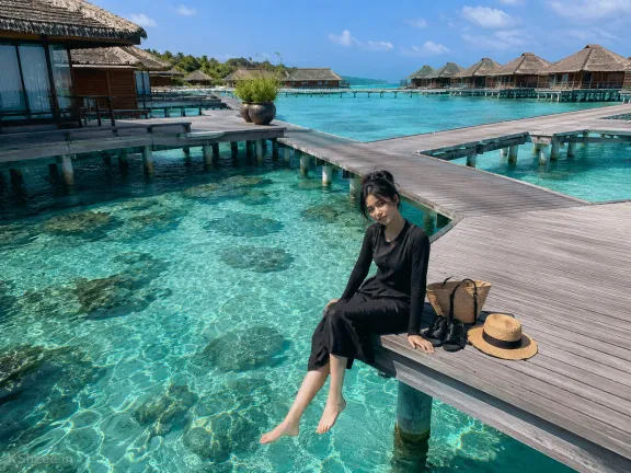Tropical Resort Woman Sitting by Turquoise Water AI Prompt for Stunning Travel Photos Tropical Resort Woman Sitting by Turquoise Water AI Prompt for Stunning Travel Photos